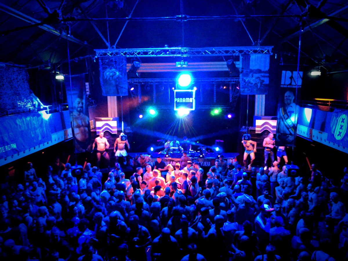 A thronging dancefloor full of indistinguishable gays. There's shirtless dancers onstage. Looks intense.