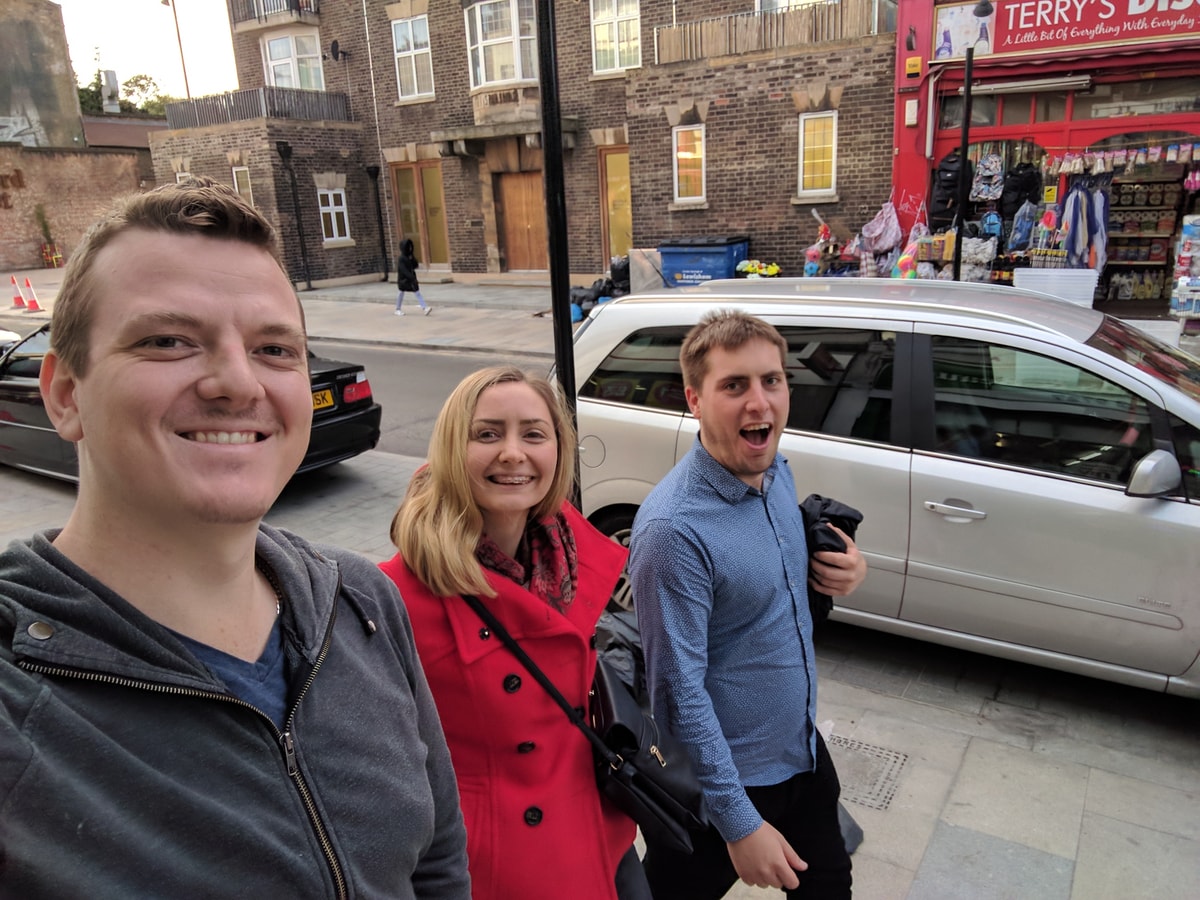 Shashi, Tom and I walking down a grubby London street.