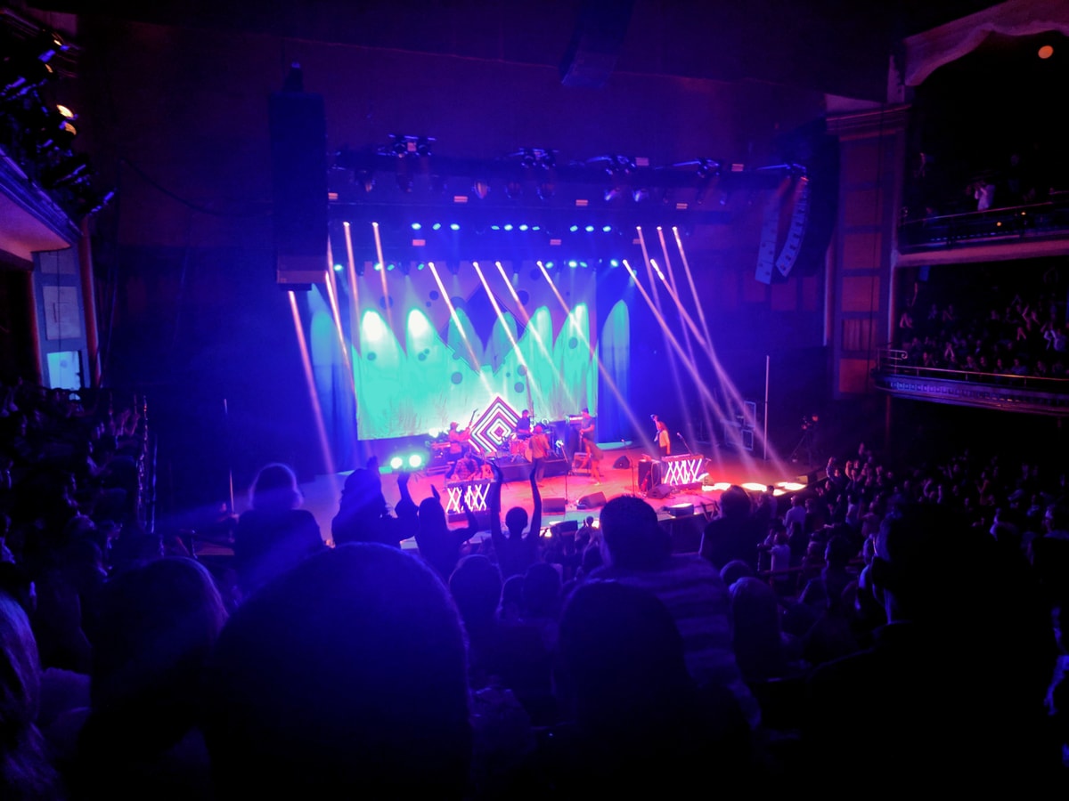 Inside Massey Hall, The New Pornographers play to a packed venue.