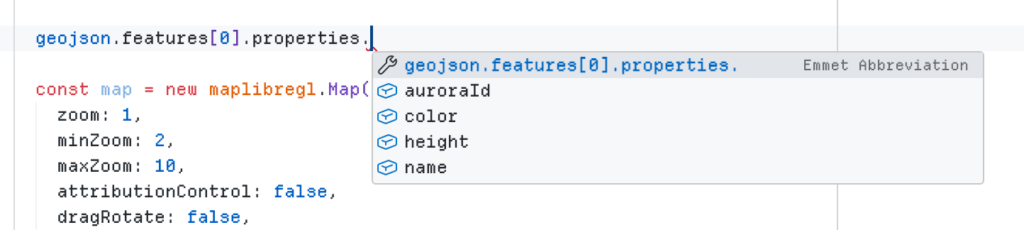 In VSCode, accessing properties on a GeoJSON feature shows a dropdown with recommendations based on our types.