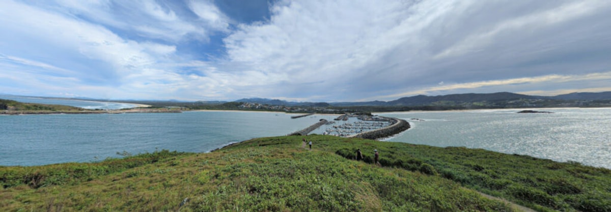 Panoramic view from Muttonbird Island, over the harbour and mountains beyond